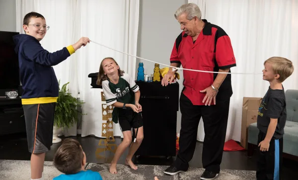 Kids laughing at a Magic Guy birthday show