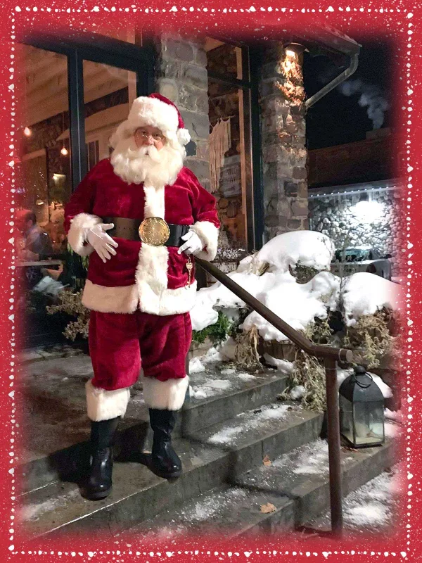Santa Guy posing with guests at a Michigan holiday event